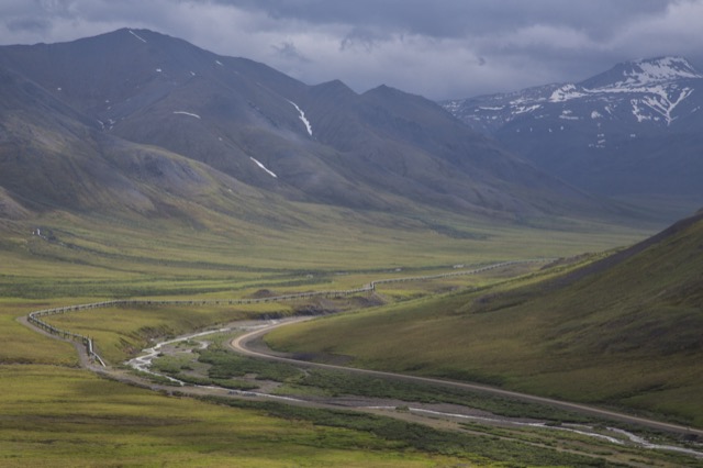 The Dalton Highway and pipeline corridor running through open Arctic terrain