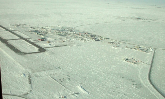 Aerial view of the snow-covered Deadhorse industrial camp and airstrip on the North Slope